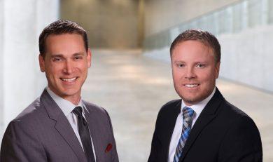 Image of Tanner Fanello and Brian Baker wearing suits and smiling