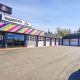 Exterior of Sparkulous automotive building with garage bays at Monaco & Leetsdale.